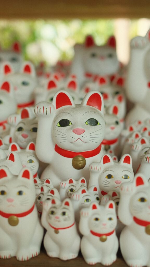 Maneki-neko at Gotokuji Temple, Tokyo, Japan
