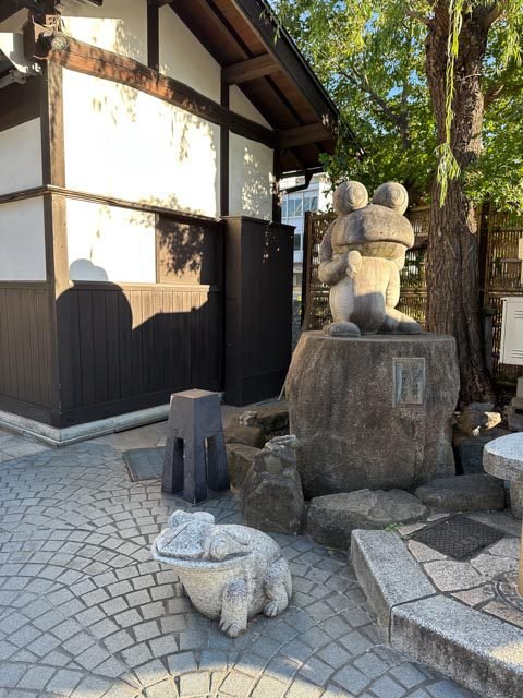 frog statues on Nawate Street, Matsumoto, Japan